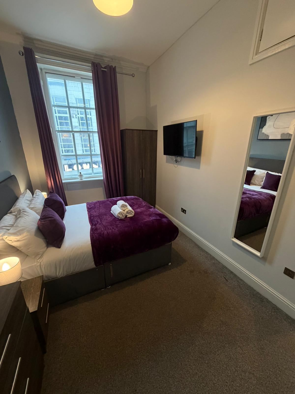 Spacious 4BR City Apartment | Terrace + Sleeps 105